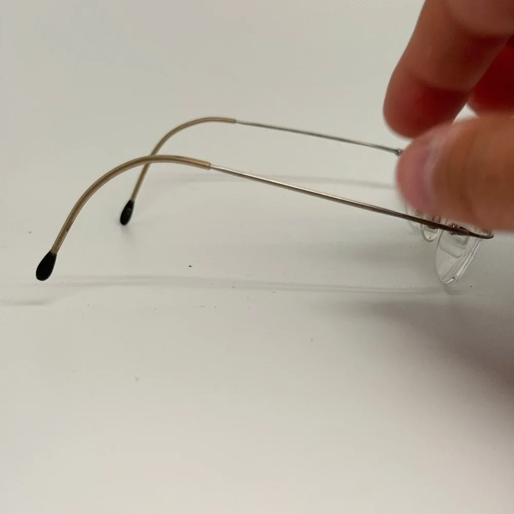 Charmant CH8600 Silver Beta Titanium Rimless Eyeglass Frames 49-19-140mm